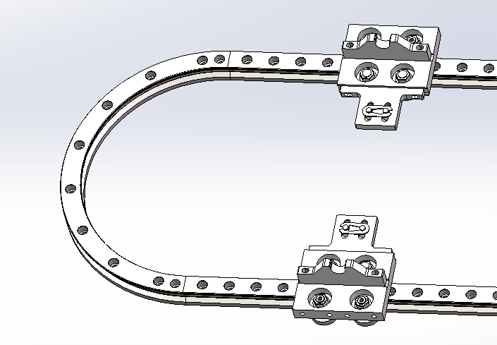 環(huán)形導軌循環(huán)輸送線轉彎時為什么不會卡住？